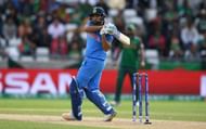 BIRMINGHAM, ENGLAND - JUNE 15:  Rohit Sharma of India hits out for six runs to bring up his century during the ICC Champions Trophy Semi Final between Bangladesh and India at Edgbaston on June 15, 2017 in Birmingham, England.  (Photo by Gareth Copley/Getty Images)